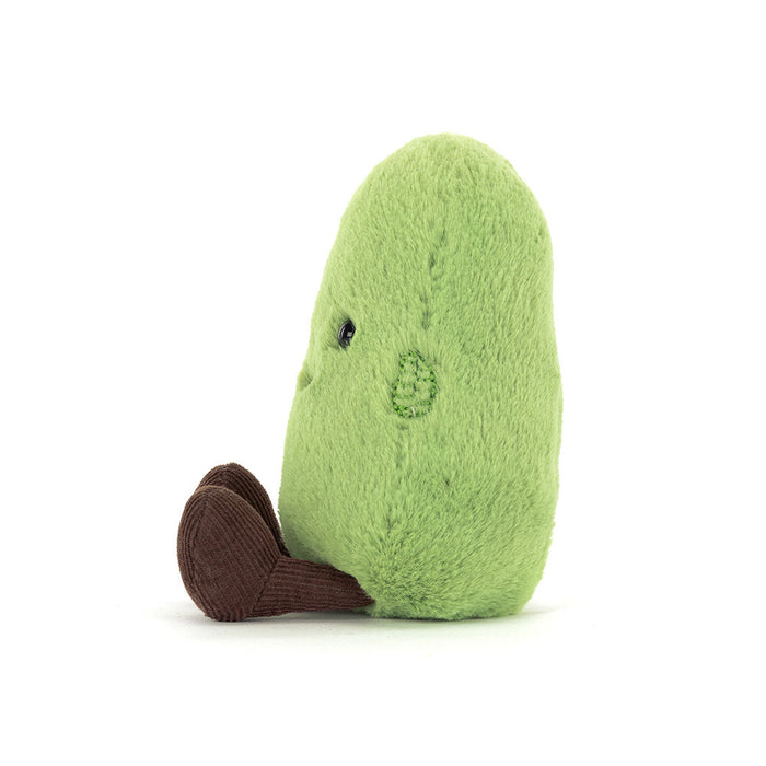 Jellycat Amuseables Soyella Edamame Bean — side view of the plush green edamame bean character showing the profile, one visible black eye, an embroidered Jellycat logo on the back, and dark brown corduroy feet, on a white background