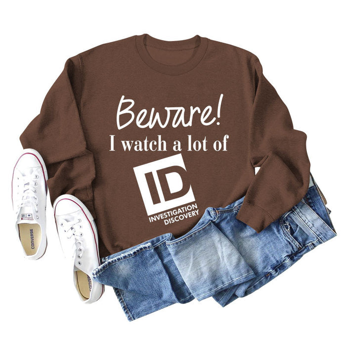 Coffee colored sweater (white font) / S