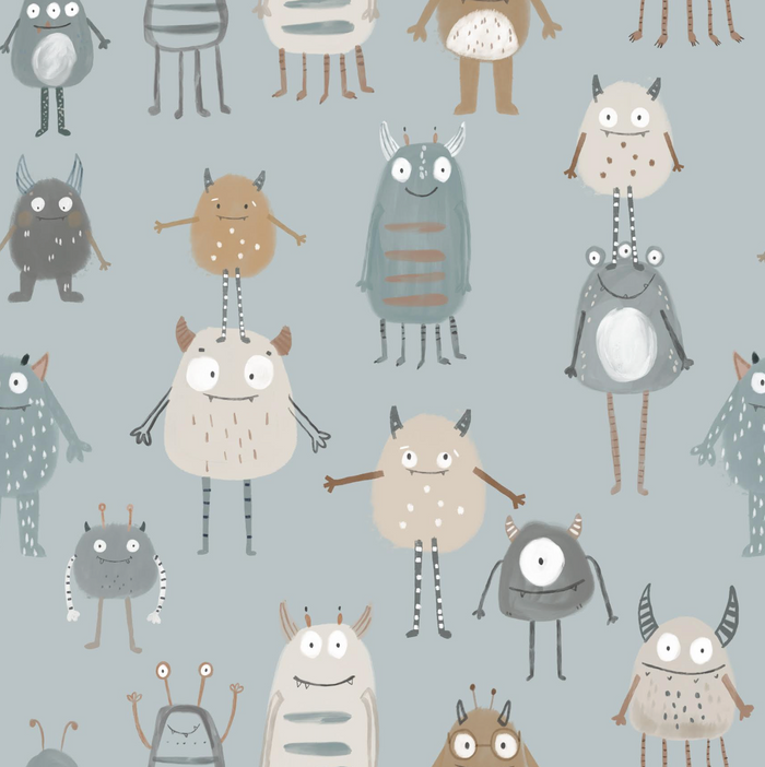 Pattern of cartoon monsters on a light blue background