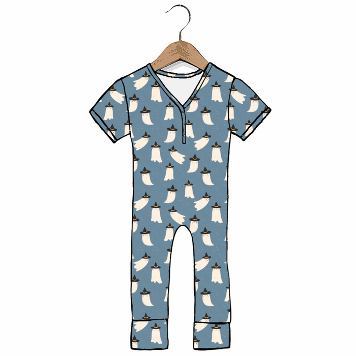 A baby one-piece romper in dusty blue with a repeating white ghost pattern, hanging on a wooden hanger against a plain white background.