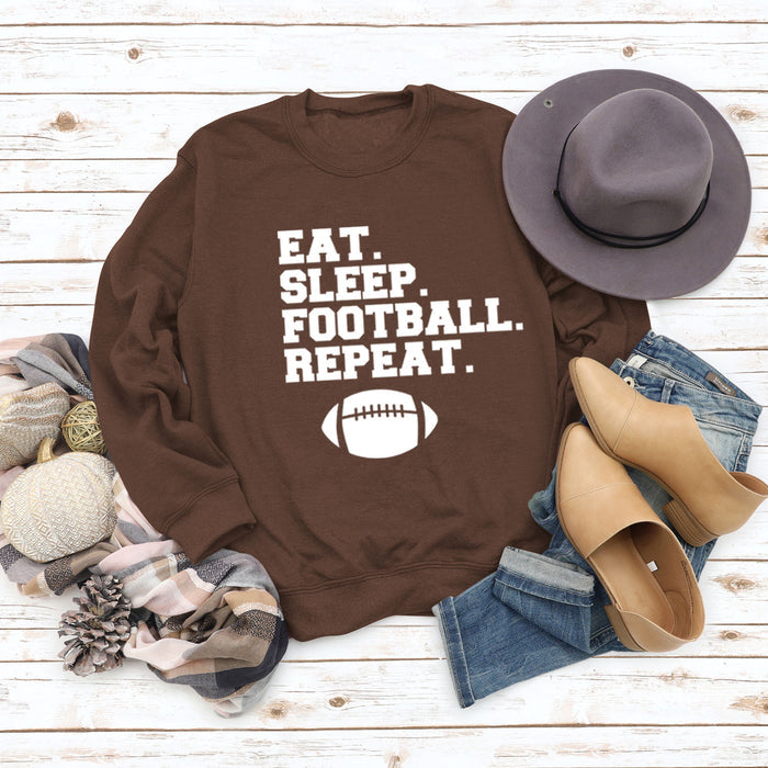 Coffee colored sweater (white font) / S