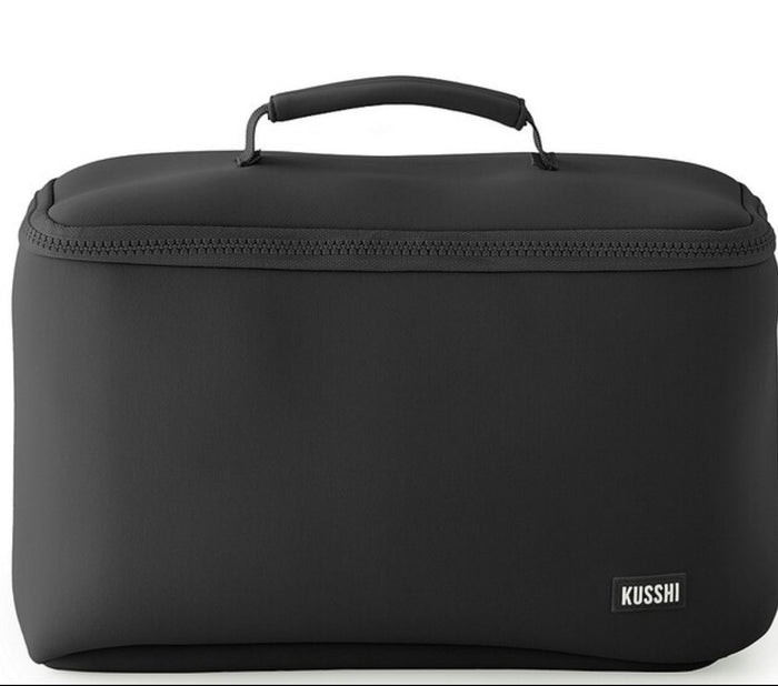 Black toiletry bag with 'Kusshi' branding on a white background