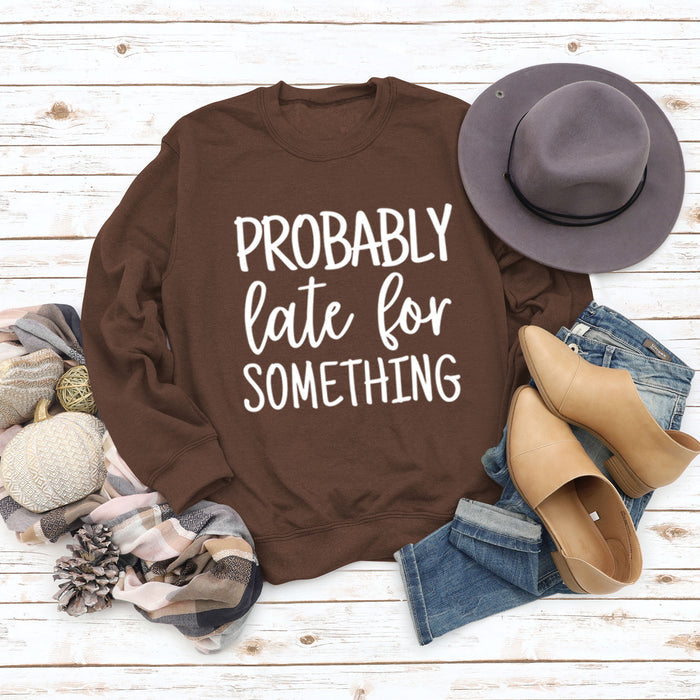 Coffee colored sweater (white font) / S
