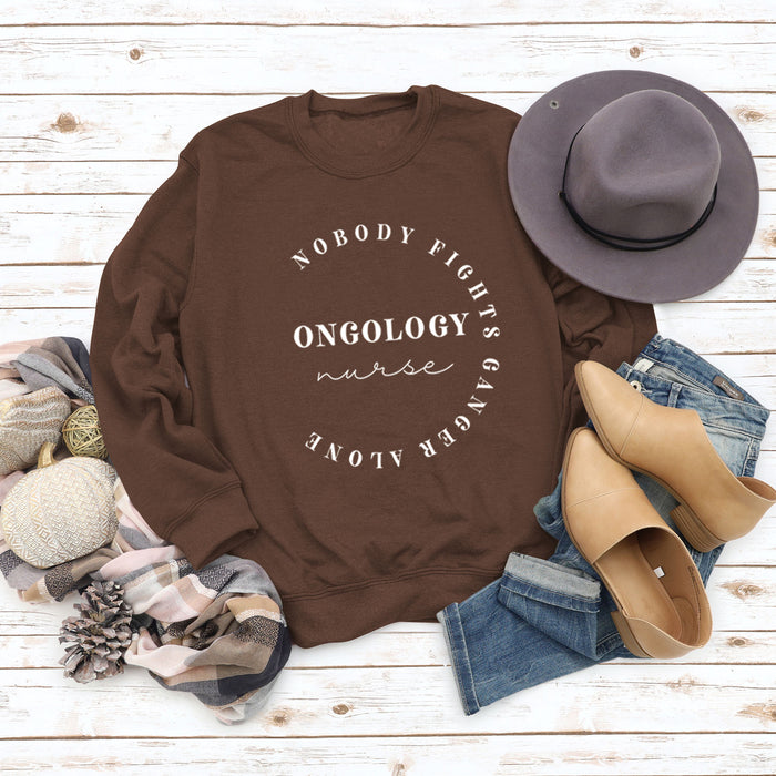 Coffee colored sweater (white font) / S