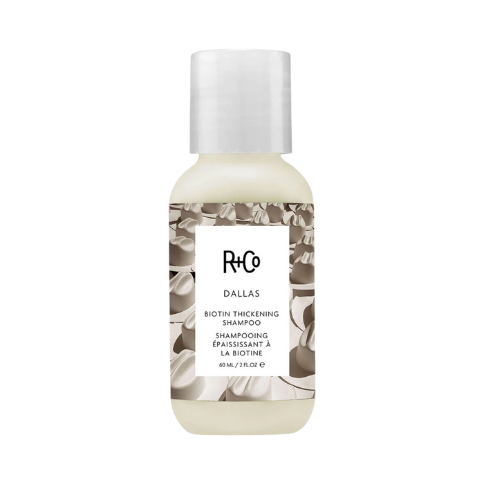 R+Co Dallas Biotin Thickening Shampoo bottle on a white background