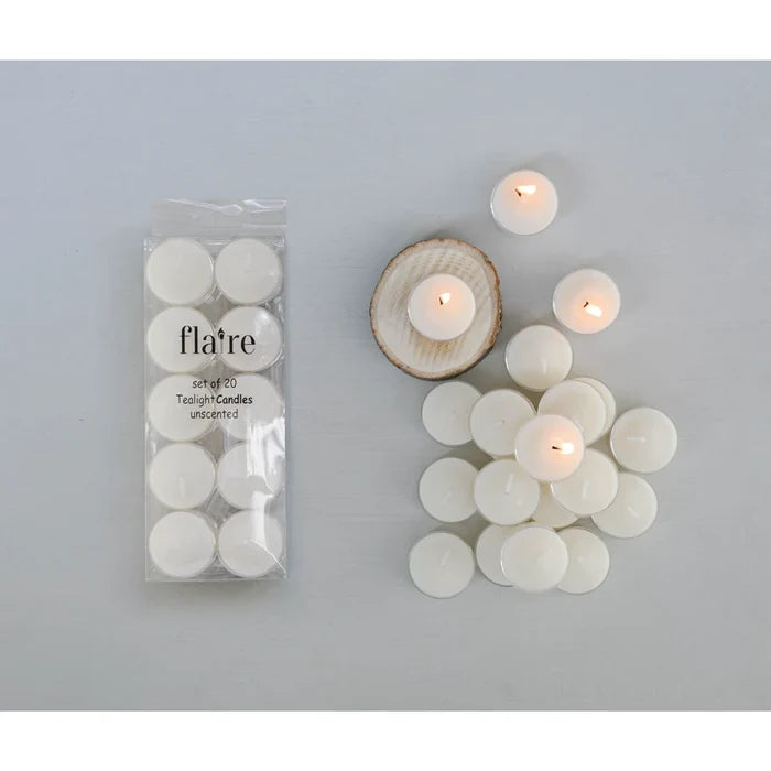Flare brand teacandle packaging with lit candles on a gray background