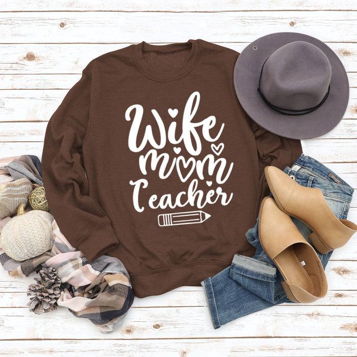 Coffee colored sweater (white font) / S