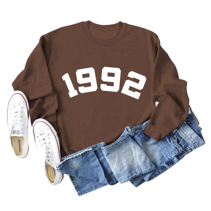 Coffee colored sweater (white font) / S