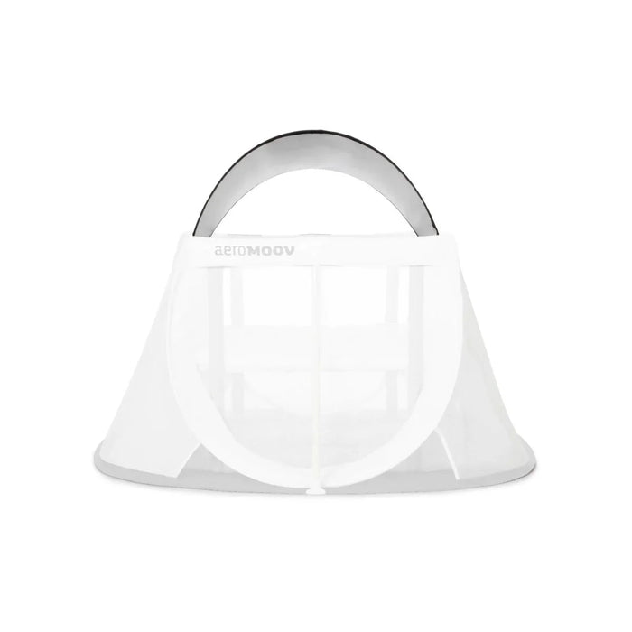 White portable baby travel bed with Aeromoov Sunshade UV50+ for on-the-go comfort