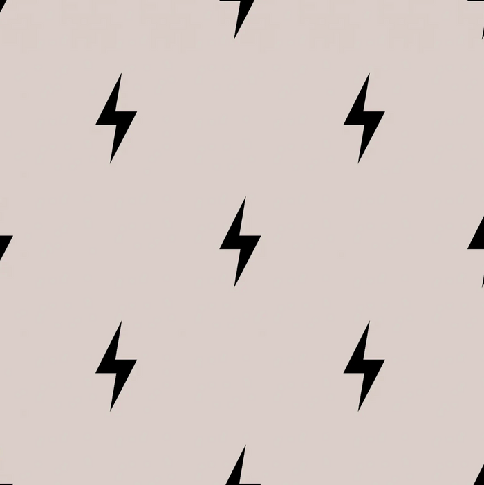 Pattern of black lightning bolts on a beige background