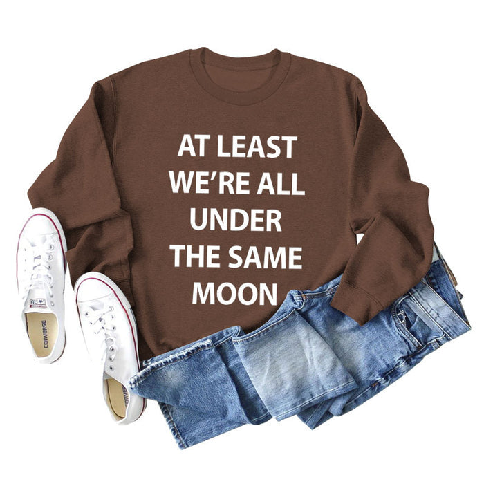 Brown sweater (white font) / S