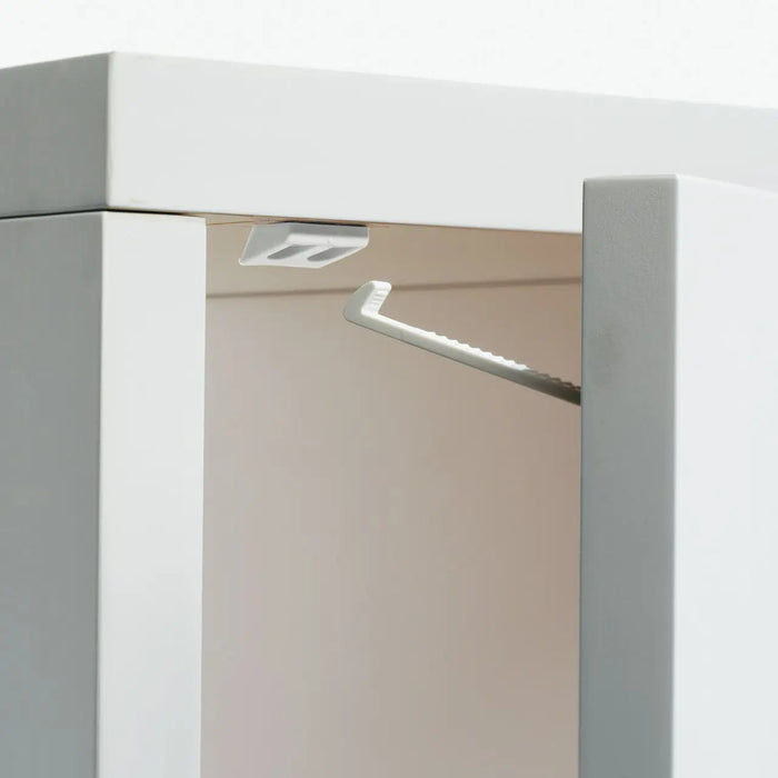 White cabinet with interior lighting for toshi baby and babydan drawer safety locks