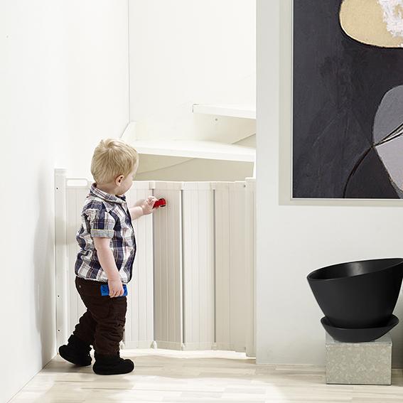 White baby gate from BabyDan Guard Me for safe space, perfect with Toshi baby romper