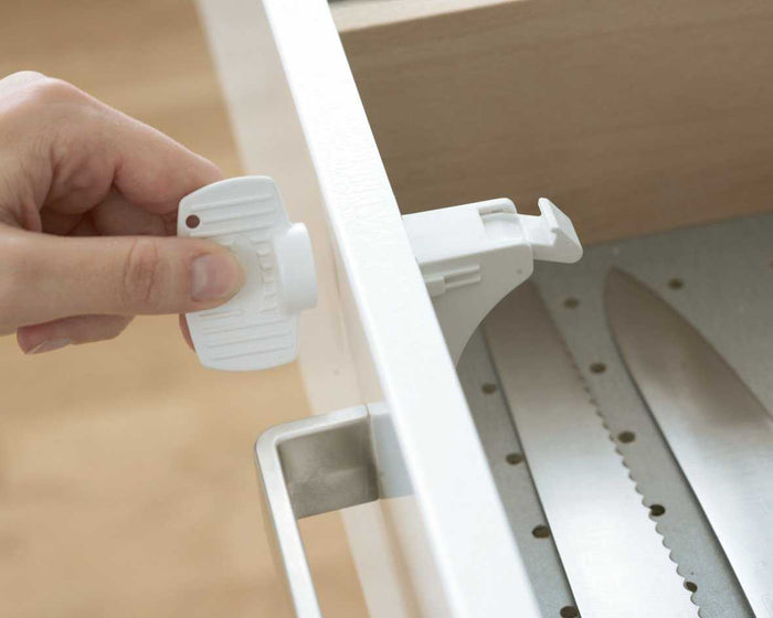 White magnetic child safety lock for BabyDan magnetic drawer and cupboard safety