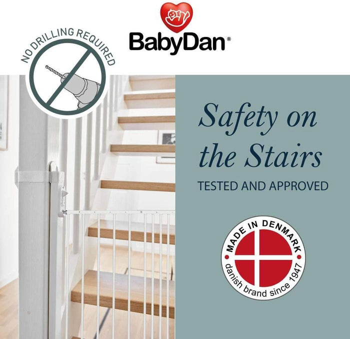 White baby safety gate with BabyDan No Drilling Universal Staircase Adaptor kit for easy install