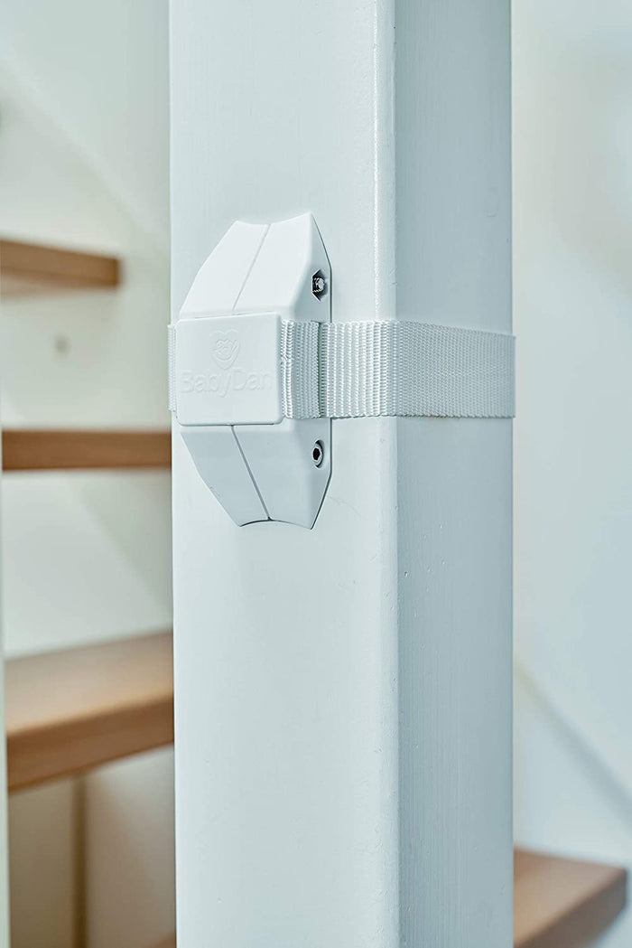 White stair safety gate with BabyDan No Drilling Universal Staircase Adaptor Installation Kit