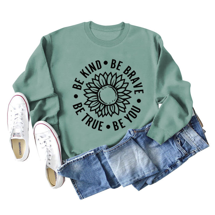 Light green sweater (black font) / S