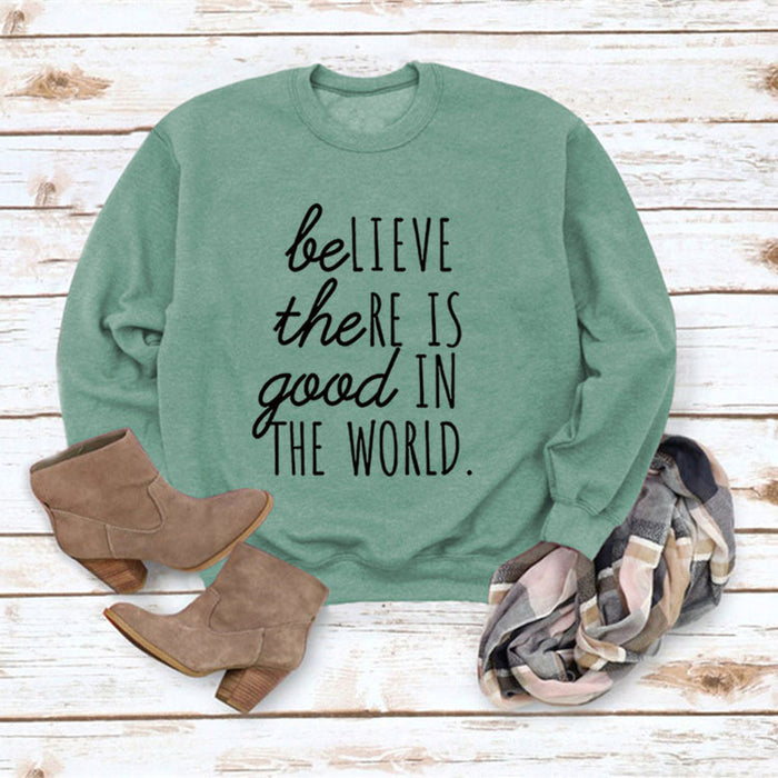 Light green sweater (black font) / S