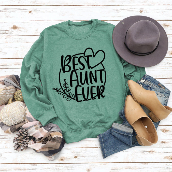 Light green sweater (black font) / S
