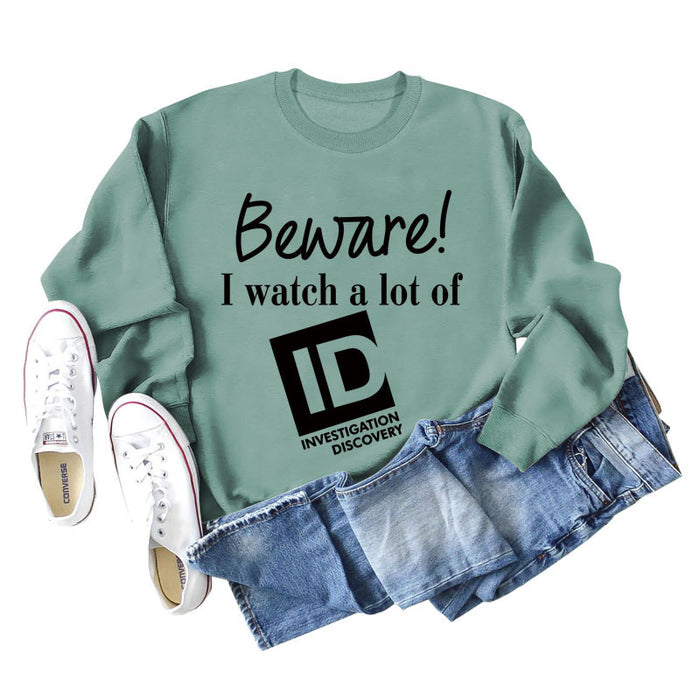 Light green sweater (black font) / S