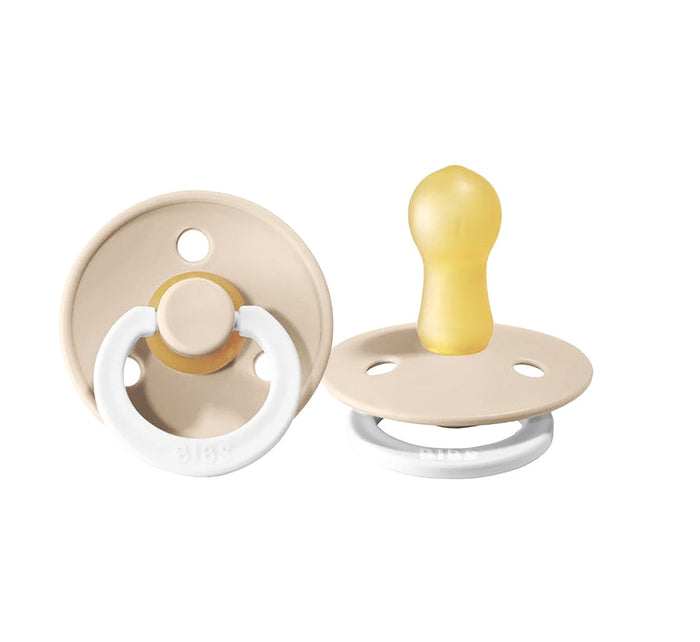 Two beige BIBS Pacifiers Colour Night Glow Vanilla for toshi baby, perfect for baby strollers