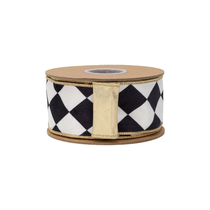 Roll of ribbon with black and white checkered pattern on a white background