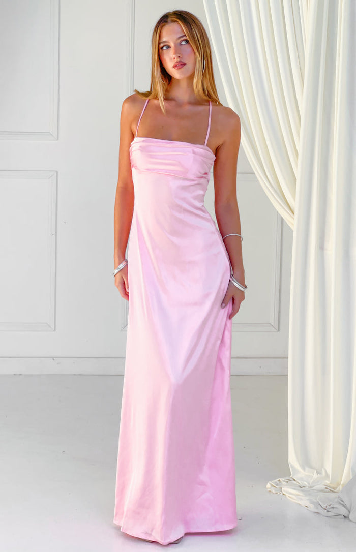 Full length pink satin maxi dress with a straight neckline and thin spaghetti straps
