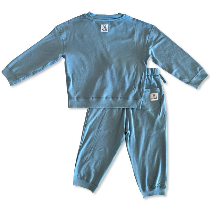 Blue children's sweatshirt and pants set on a white background