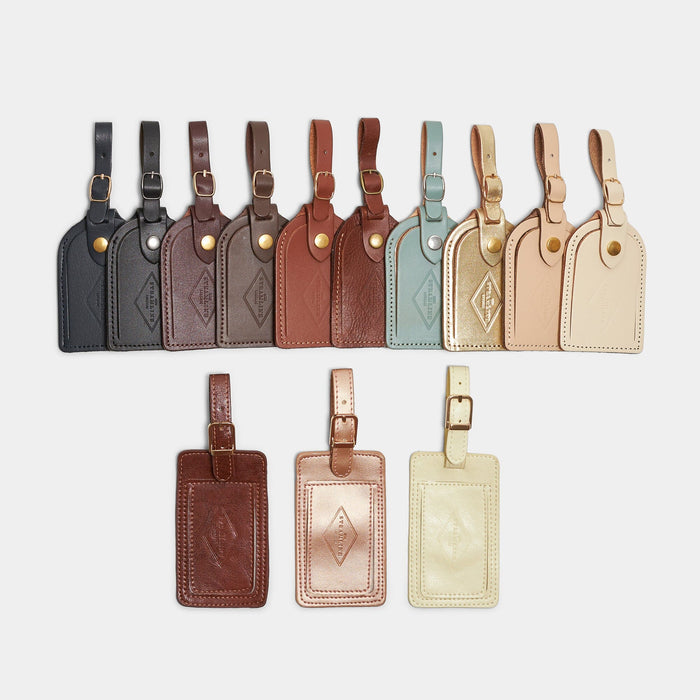 thirteen colour options of leather luggage tags