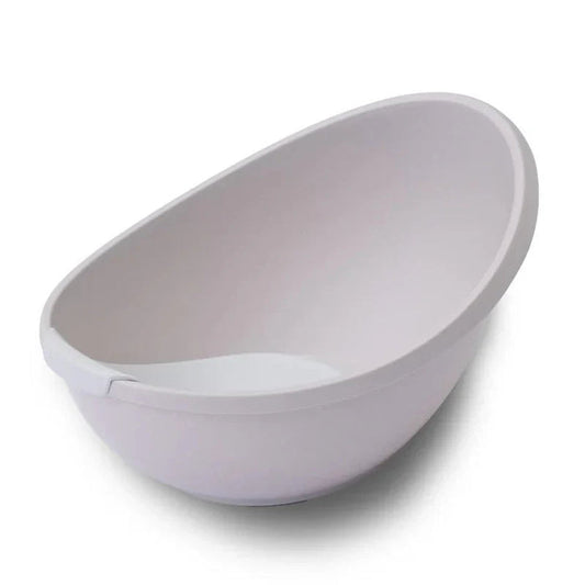 White plastic baby bathtub with bubble cuddle bath and Toshi Baby newborn support insert