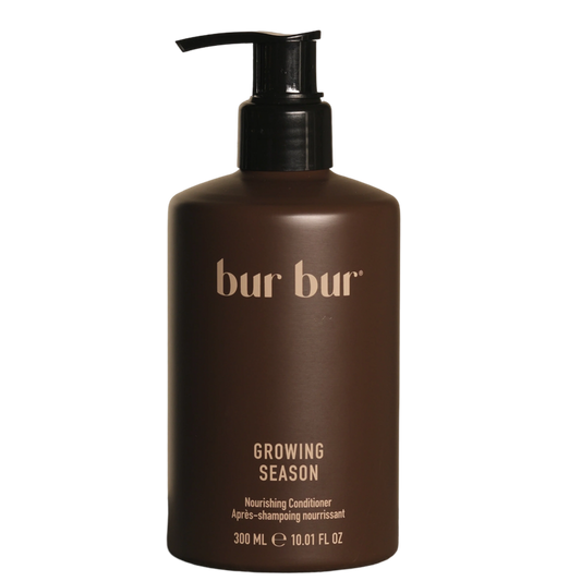 Brown bottle of 'bur bur' Growing Season Nourishing Conditioner on a white background