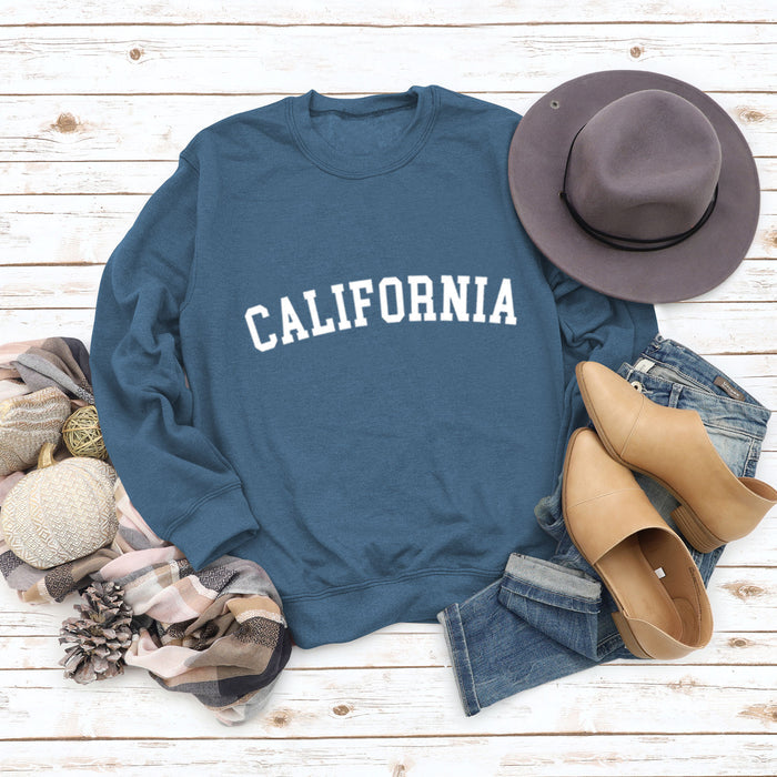 Blue sweater (white font) / S