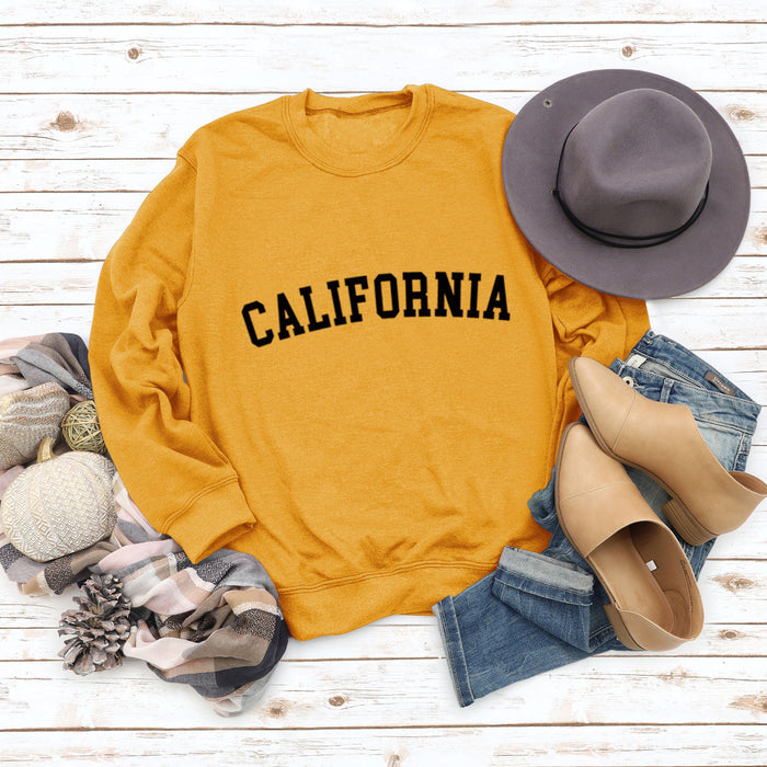 Yellow sweater (black font) / S