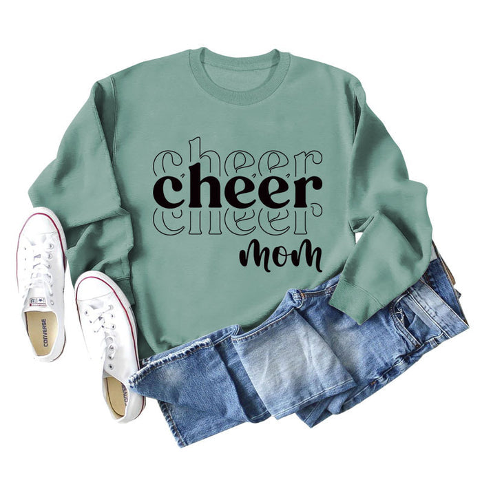 Light green sweater (black font) / S