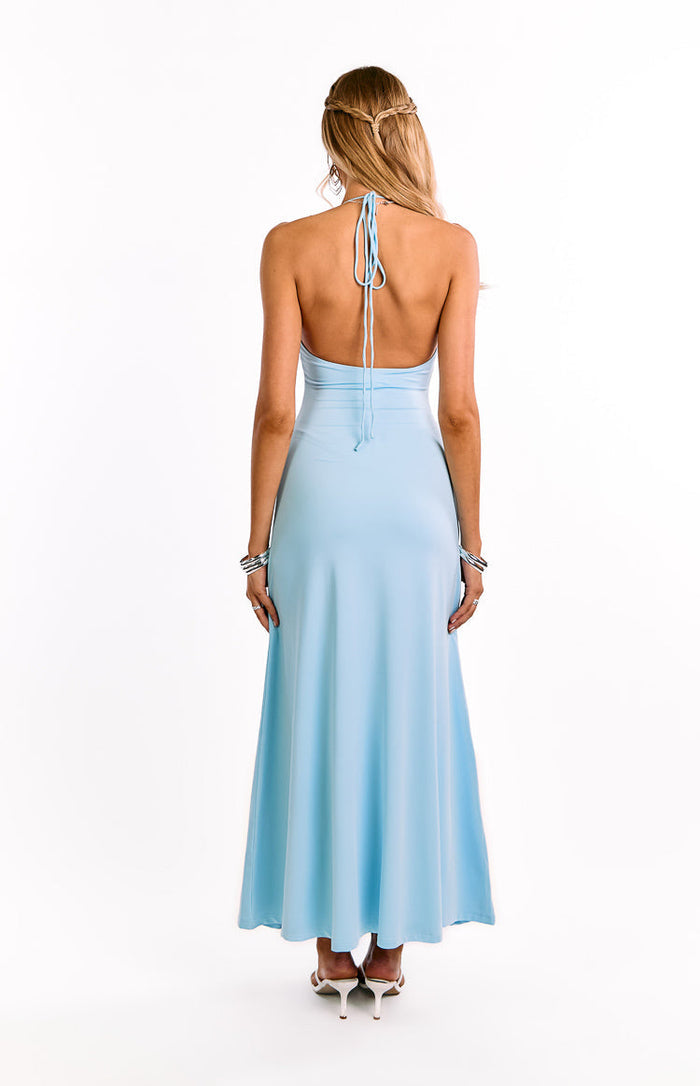 Rear view of a light blue halter maxi dress showing the tie-up back and open back design