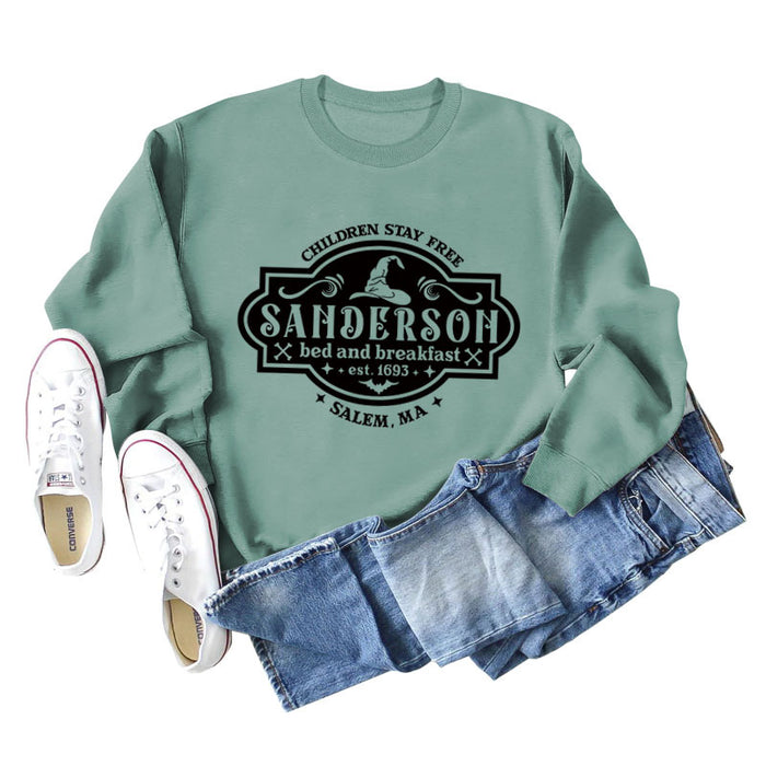Light green sweater (black font) / S