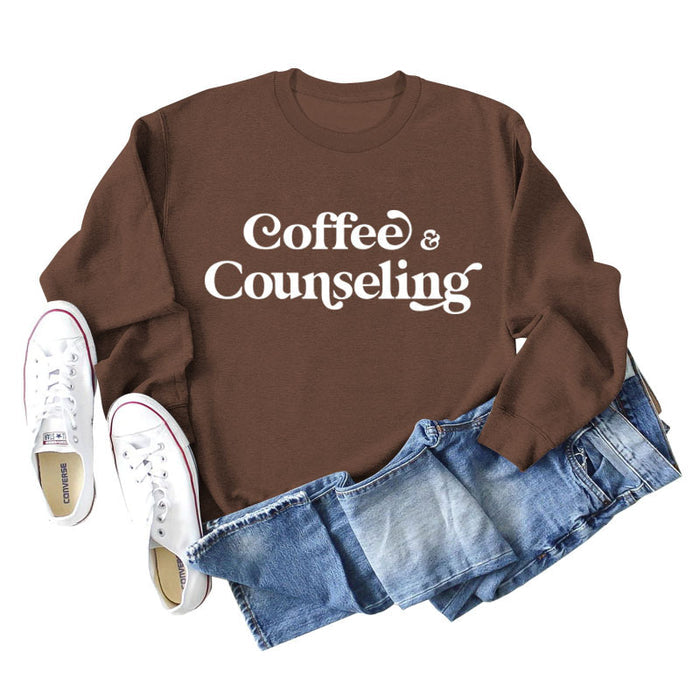 Coffee colored sweater (white font) / S