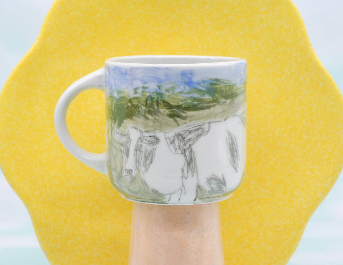 Cow in the Field Mug