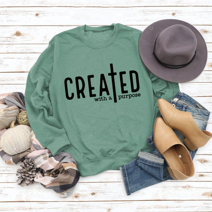 Light green sweater (black font) / S