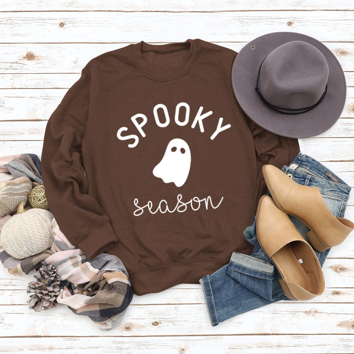 Brown sweater (white font) / S