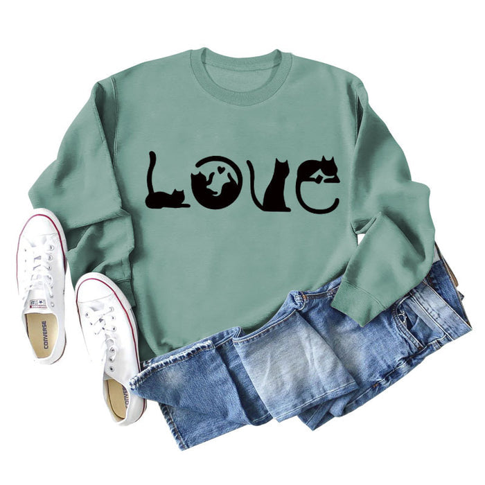 Light green sweater (black font) / S