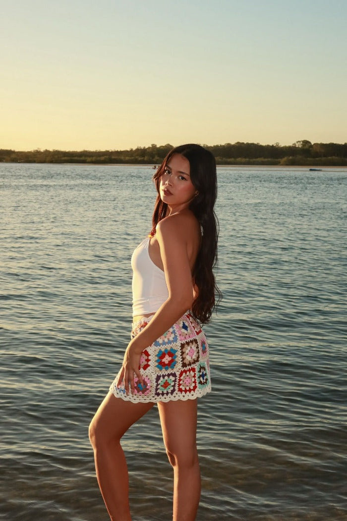 Beginning Boutique Davina White Crochet Mini Skirt white crochet mini skirt with colourful granny square pattern and scallope