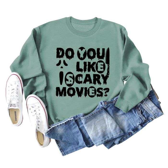 Light green sweater (black font) / S
