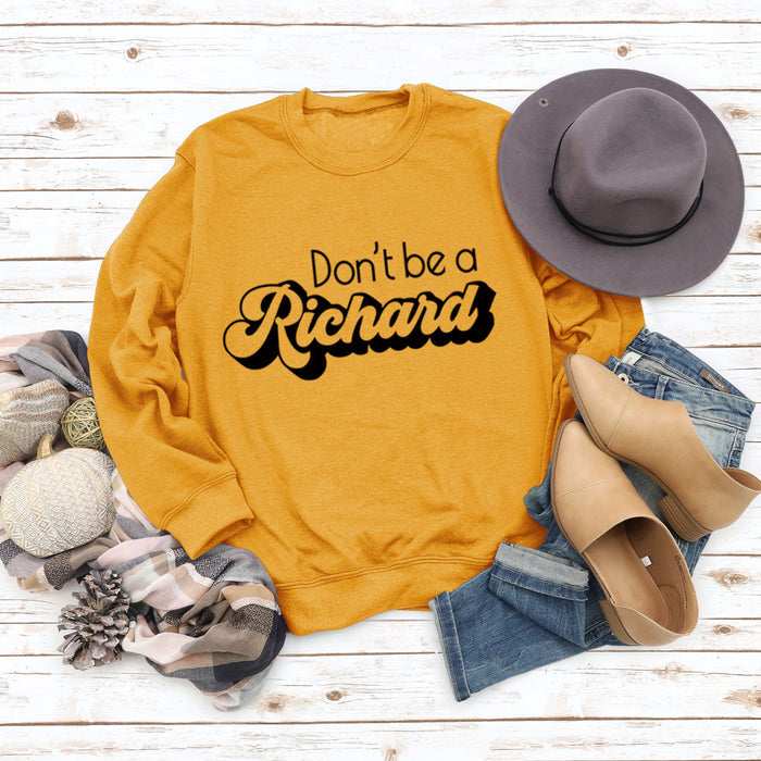 Yellow sweater (black font) / S