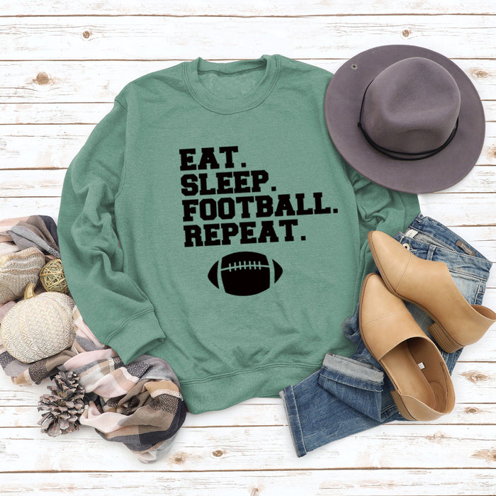 Light green sweater (black font) / S