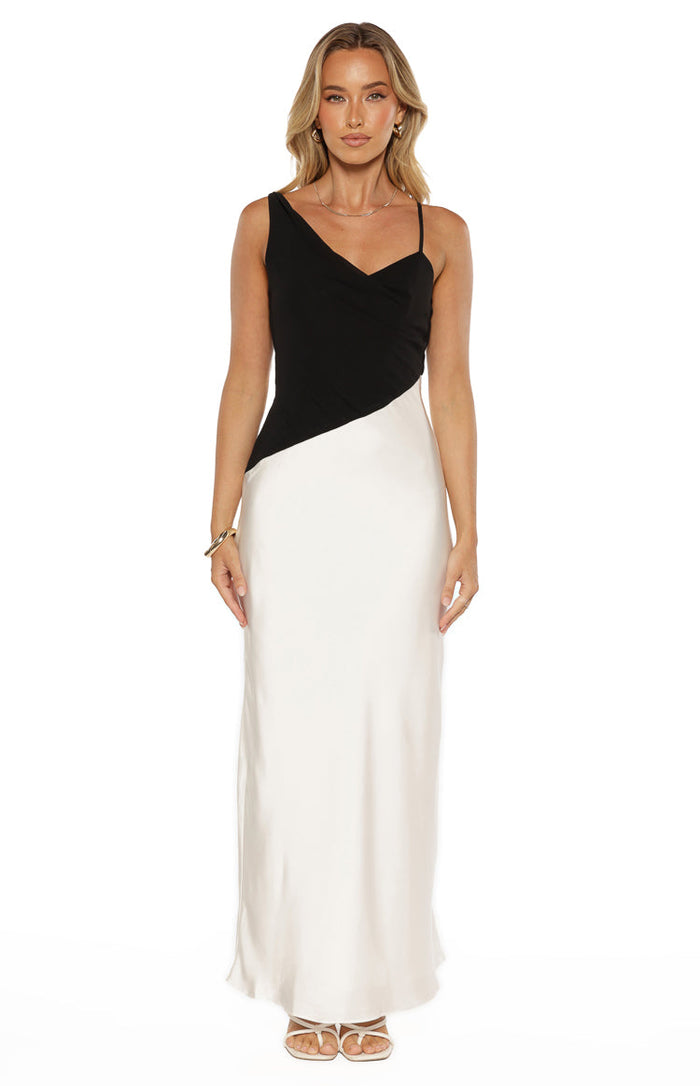Black and white two-tone satin maxi dress with a diagonal colour block and an asymmetric cowl neck
