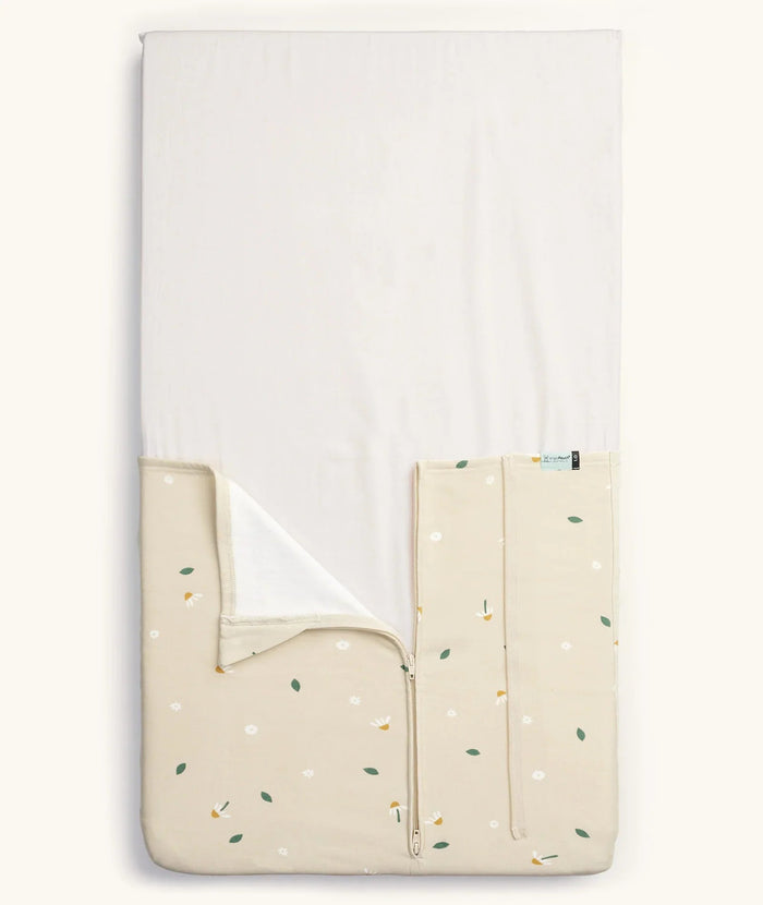 Floral-patterned baby sleeping bag from Ergopouch HugMe Blanket perfect for Toshi baby romper and baby strollers