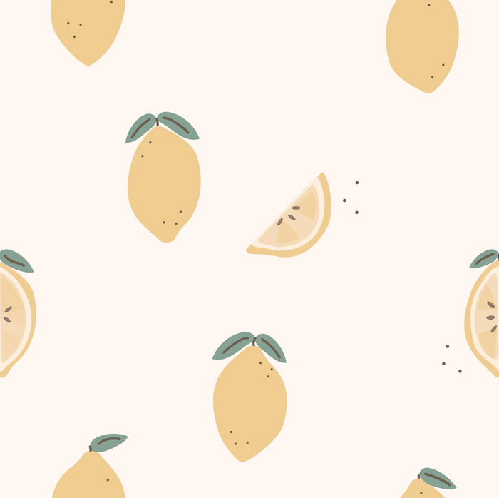 A repeating pattern of illustrated lemons in pale yellow with green leaves on a light cream background, including whole lemons, sliced lemon wedges, and small dotted accents.