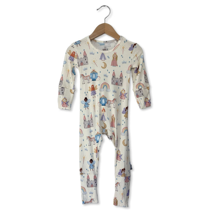Children's onesie with fairy tale design on a hanger against a white background
