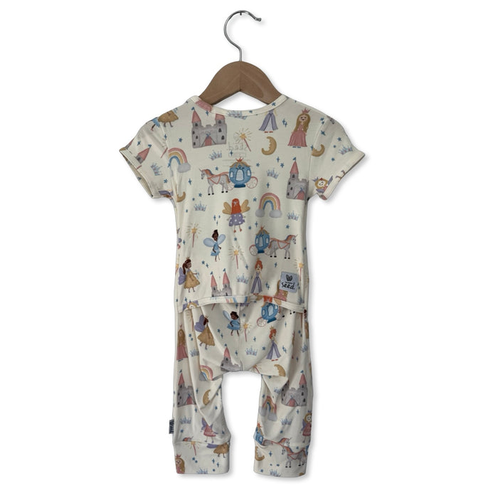 Children's onesie with a colorful pattern on a hanger against a white background